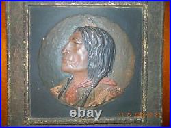 Antique relief portrait of Native American warrior hand painted on board