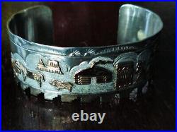 TA Begay Native American Navajo Story Bracelet 41 Gram Sterling and 12k Gold