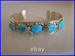 Wigwam Traders 5-Turquoise Stone Cuff with Snakes by artist Effie CalavazaK1848