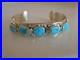 Wigwam Traders 5-Turquoise Stone Cuff with Snakes by artist Effie CalavazaK1848