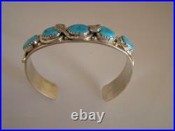 Wigwam Traders 5-Turquoise Stone Cuff with Snakes by artist Effie CalavazaK1848